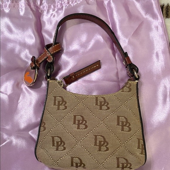 Dooney & Bourke Handbags - Dooney & Bourke Beige and Brown Itty Bitty Bag